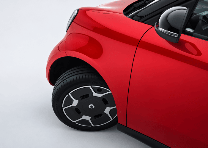 Glossy Red Compact Car Close-Up